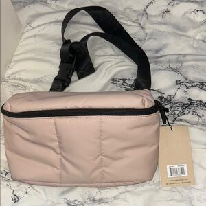 Calpak Pink Crossbody Bag with Minimalist Design
